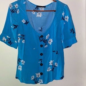 Beautiful blue blouse with white flowers